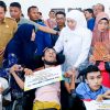 Sapa Bansos Titik ke-16 di Lamongan, Program Icon Gubernur Khofifah untuk Dongkrak Ekonomi Masyarakat Jawa Timur